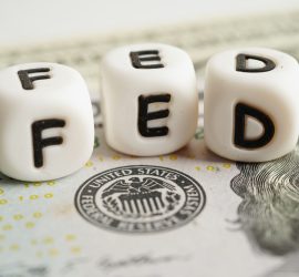 Stocks Mixed; Fed Makes a Move